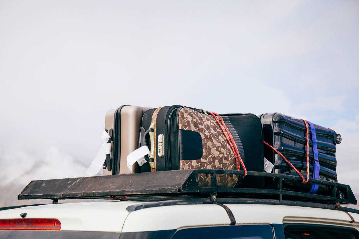 luggage on top of a car