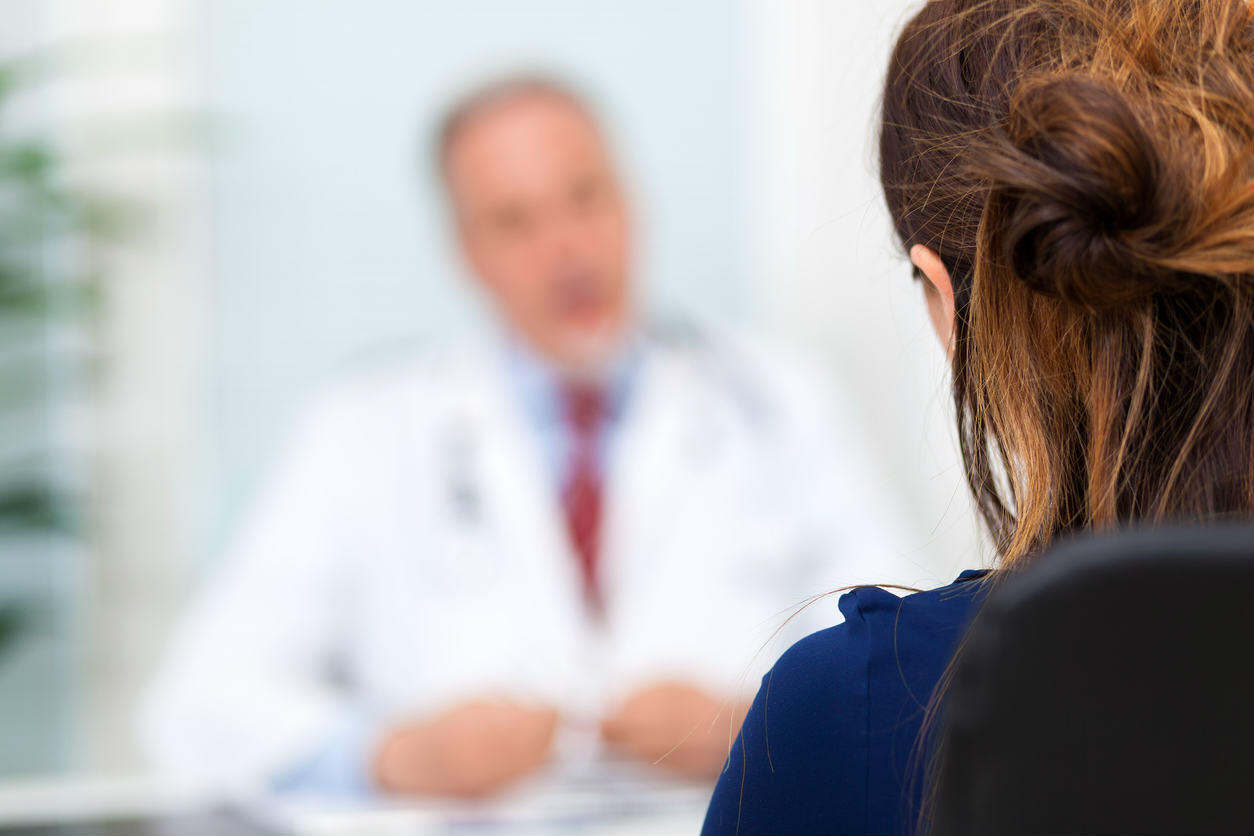 woman speaking with her doctor