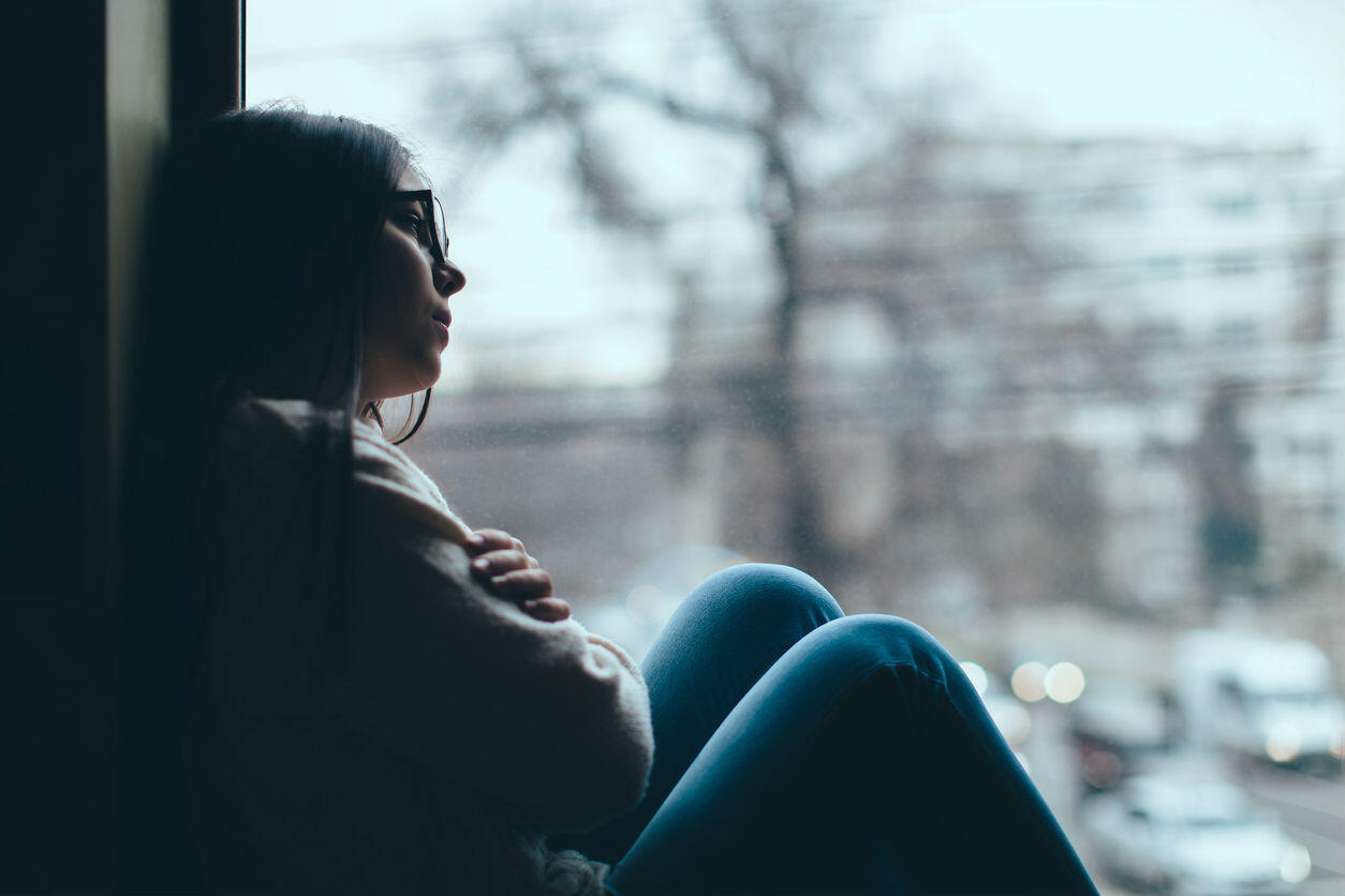 woman sad after a death in the family