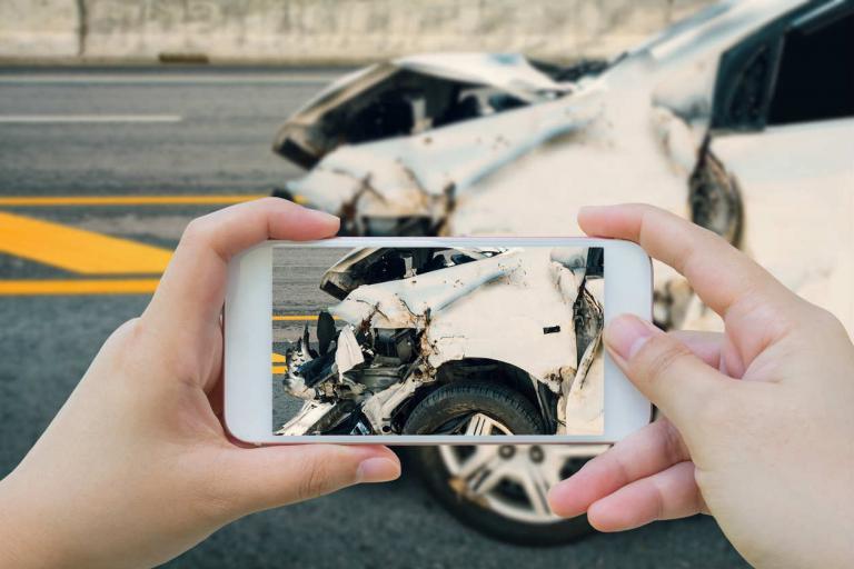 taking a picture of car accident