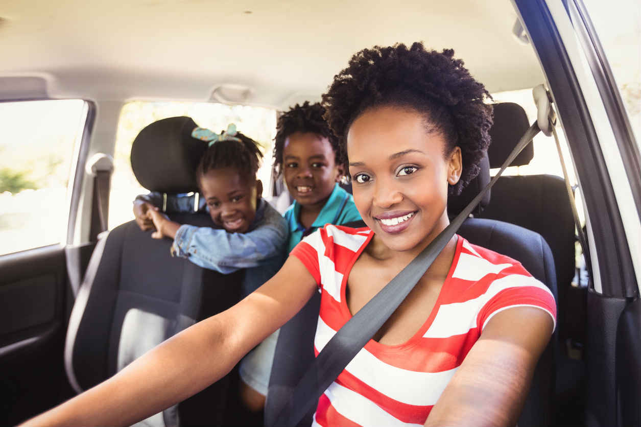 mother driving with children