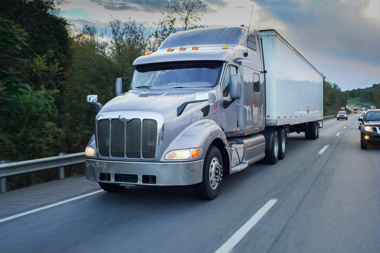 driving next to a tractor trailer