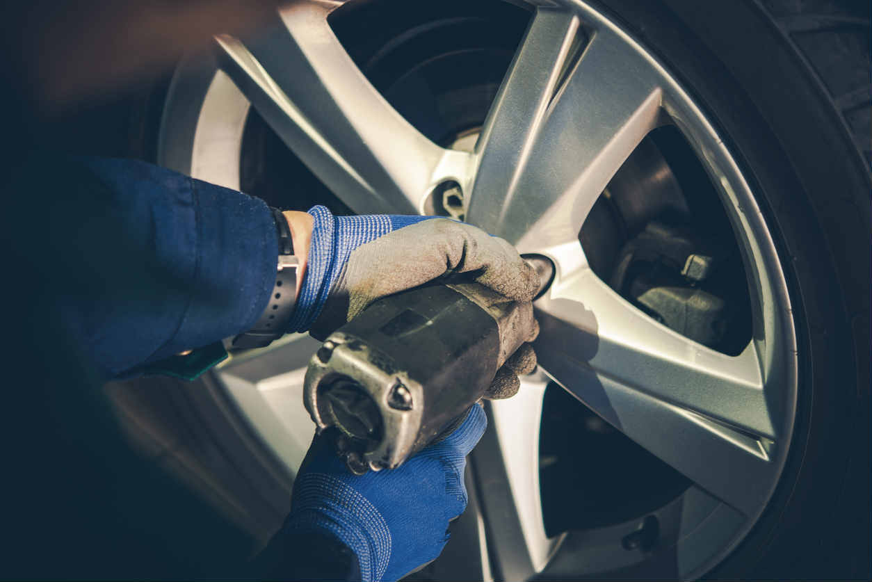 replacing tires on car