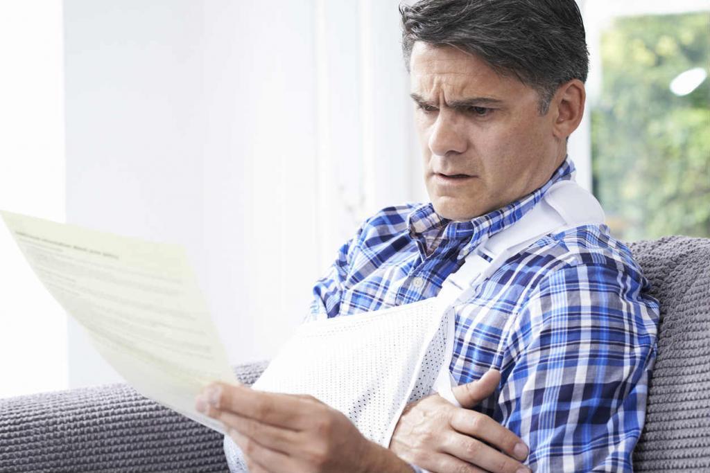 injured man reading letter