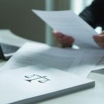 car accident lawyer examing paperwork