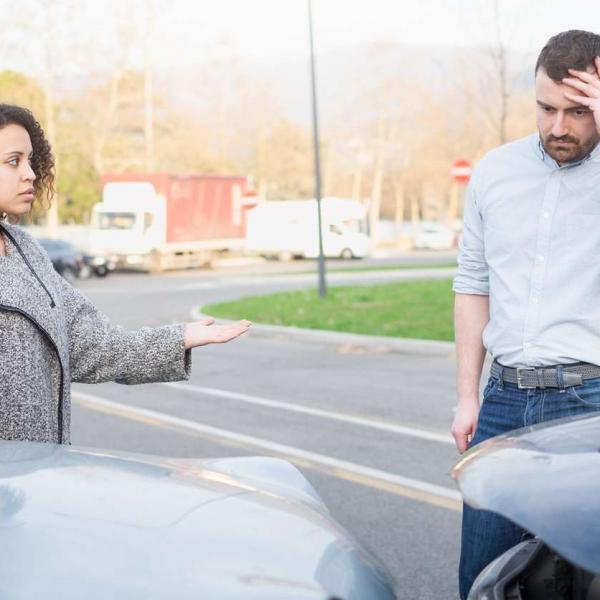 man apologizing after a car accident