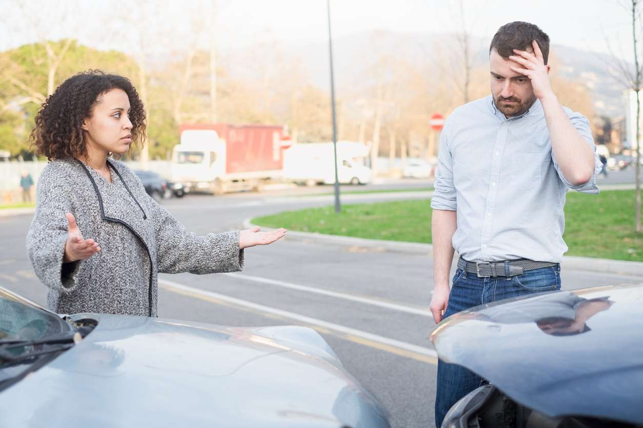 man apologizing after a car accident