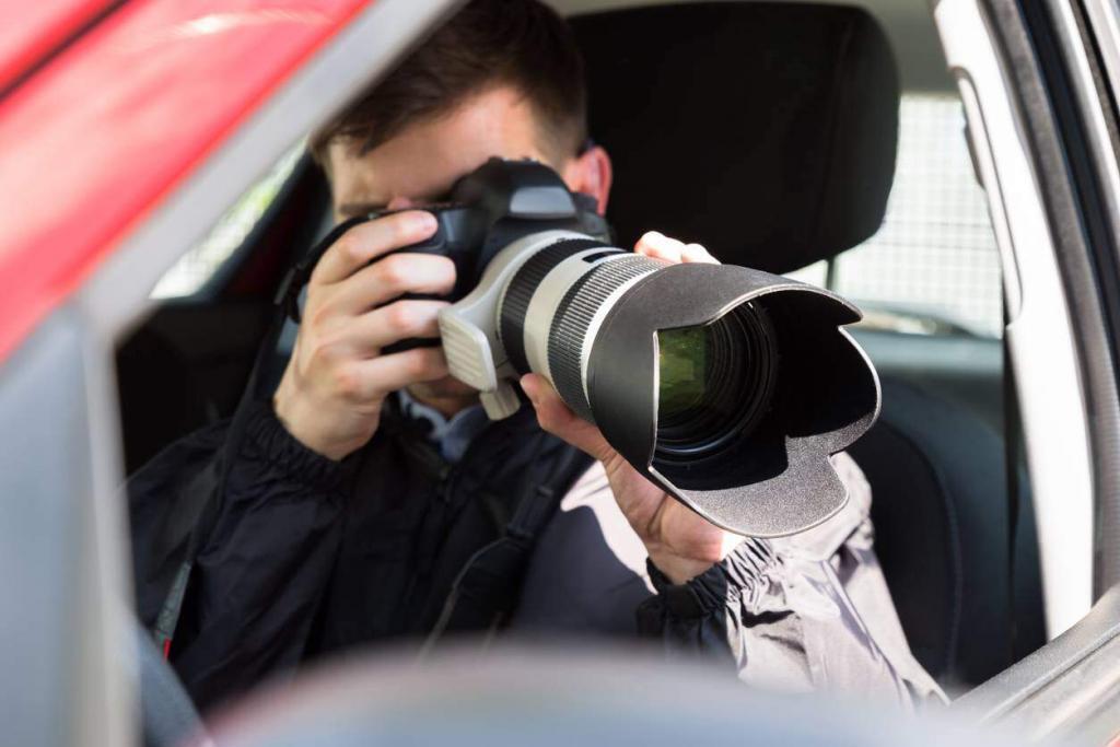 private investigator taking pictures after car accident