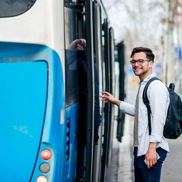 st. louis man getting on a bus