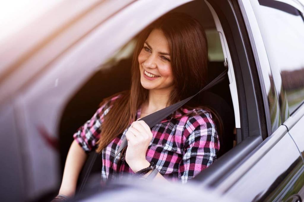 teen putting on seat belt