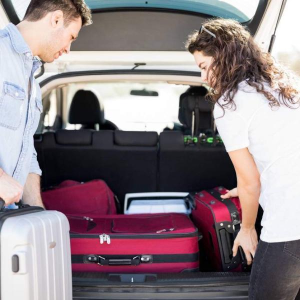 couple packing for holiday travel