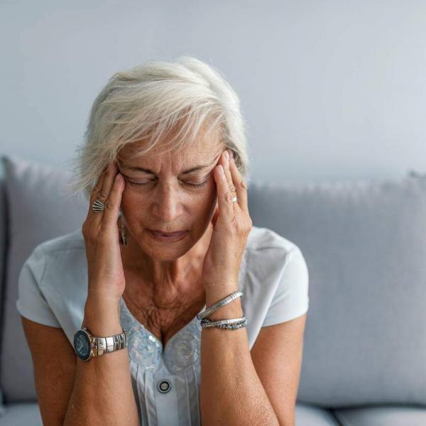 st. louis woman with a stress headache