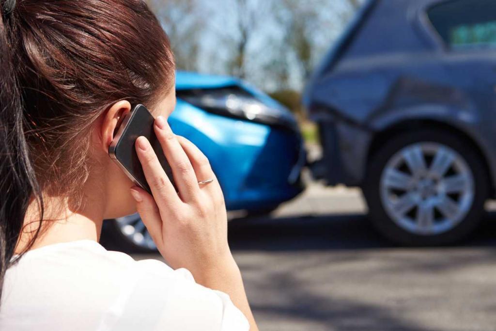 woman on phone after a car accident