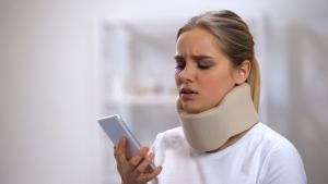 injured woman getting call from an insurance adjuster