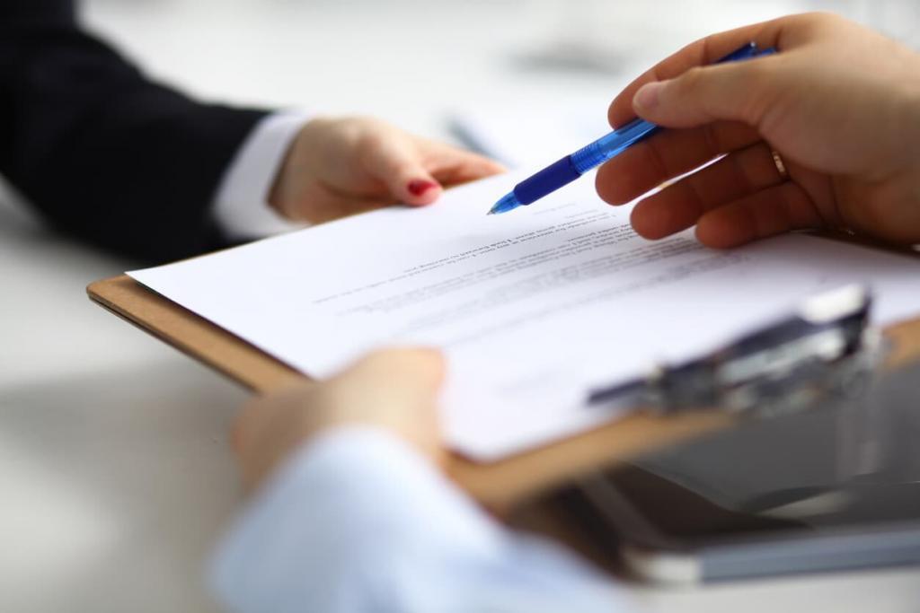 witness signing document after car accident