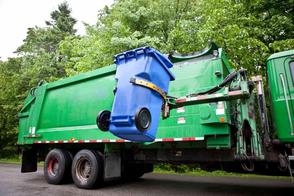 garbage truck collecting trash