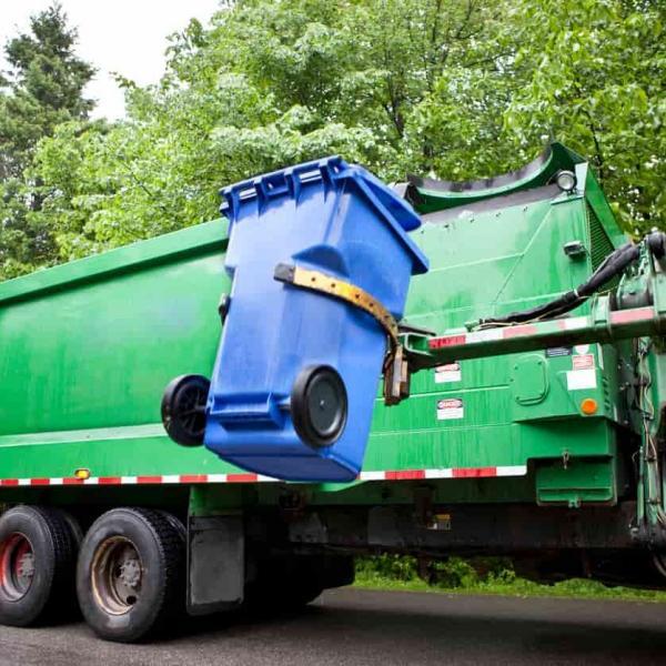 garbage truck collecting trash