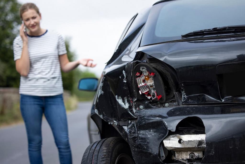 woman on the phone after a miss and run accident