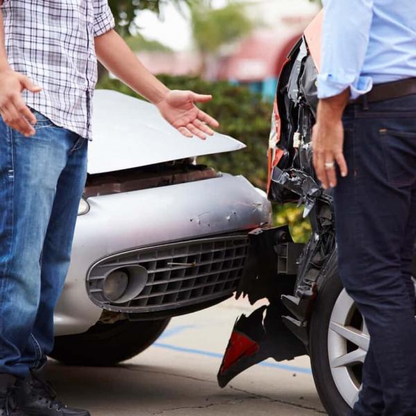 two drivers talking after car accident