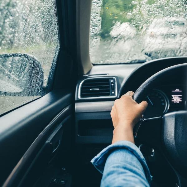 st. louis woman driving in rainy weather