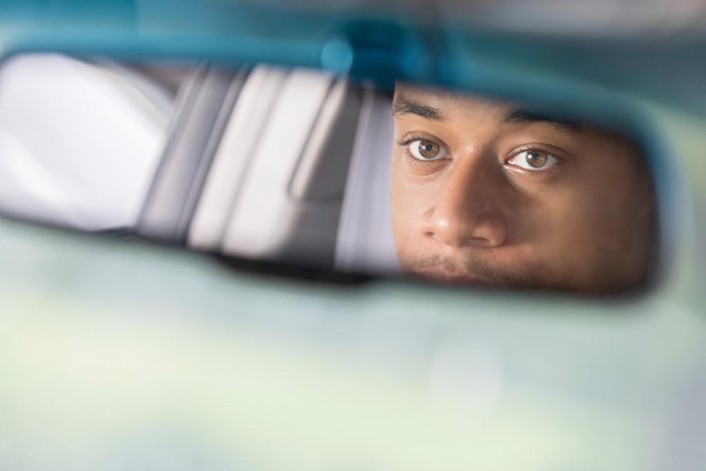 driver looking in rearview mirror