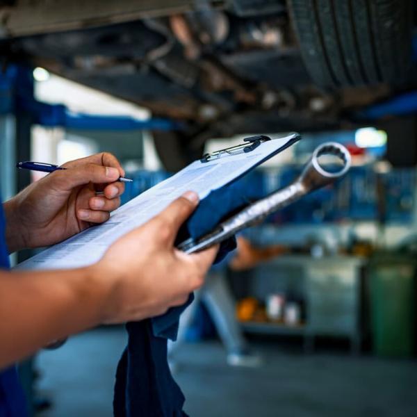 mechanic conducting a vehicle inspection