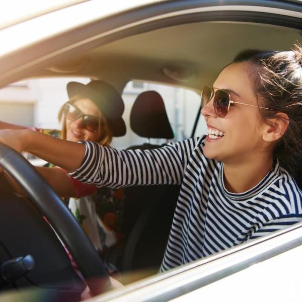 driver with passenger in the car