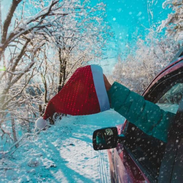 santa hat hanging out car window