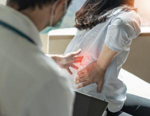 woman with back pain after a car accident