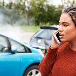 car accident victim calling police after an accident
