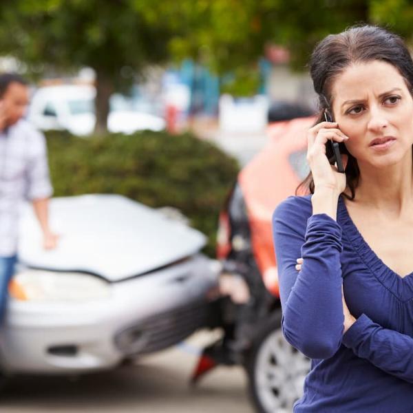 st. louis woman on the phone after a car accident