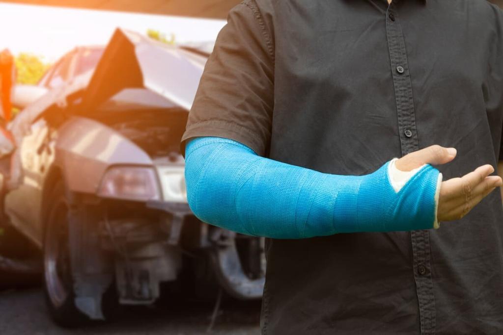 man's arm in a cast after a car accident