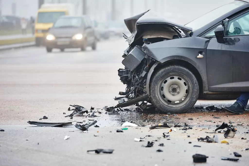 car accident caused by debris