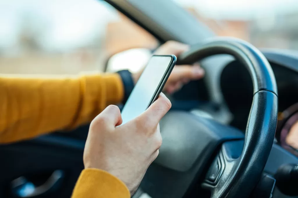 uber driver using their cell phone