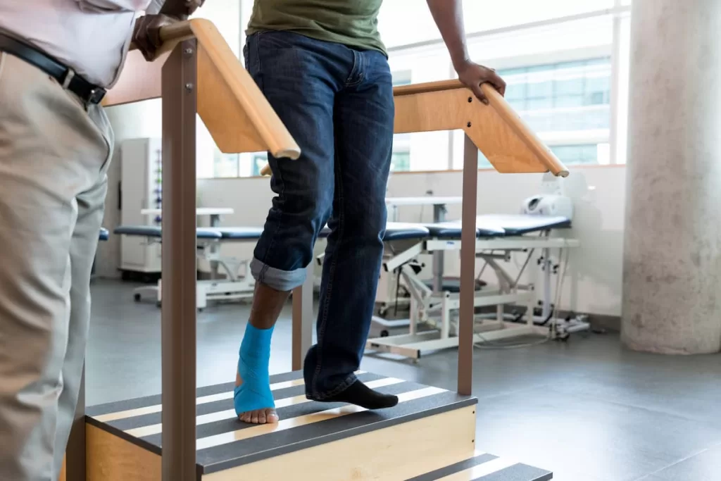 car accident victim at physical therapy after an ankle injury