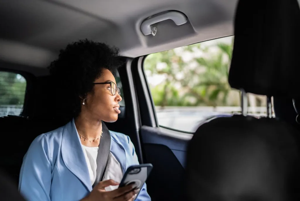 woman in the back of an uber