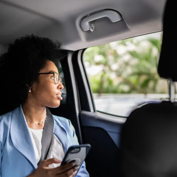 woman in the back of an uber