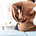man with back pain after Missouri car accident