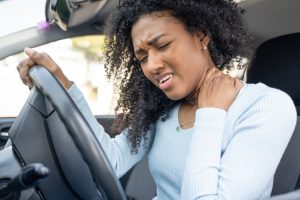 woman in clayton mo auto accident with neck pain
