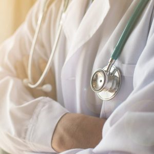 car injury specialist wearing a stethoscope