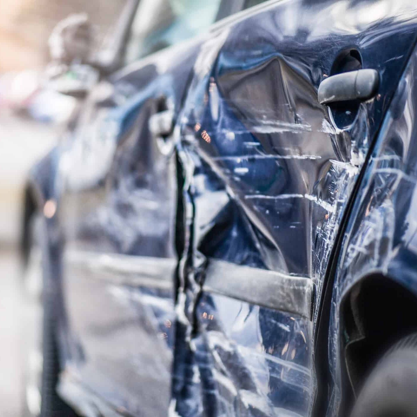 St. Louis car that has been sideswiped